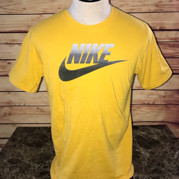 black and yellow nike shirt